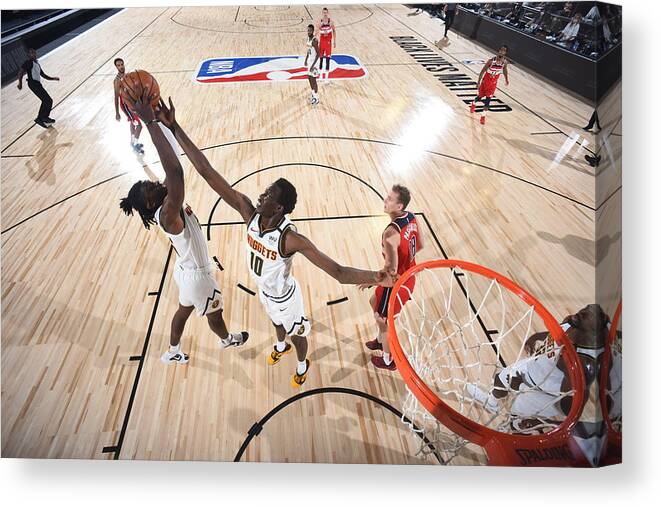 Nba Pro Basketball Canvas Print featuring the photograph Washington Wizards v Denver Nuggets by Garrett Ellwood