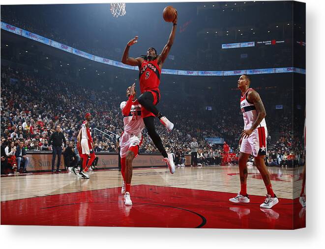 Sports Ball Canvas Print featuring the photograph Washington Wizards v Toronto Raptors by Vaughn Ridley