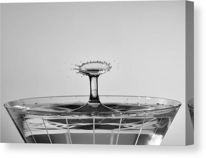 North Wilkesboro Canvas Print featuring the photograph Water Drops Collide Over Martini Glass Monochrome by Charles Floyd