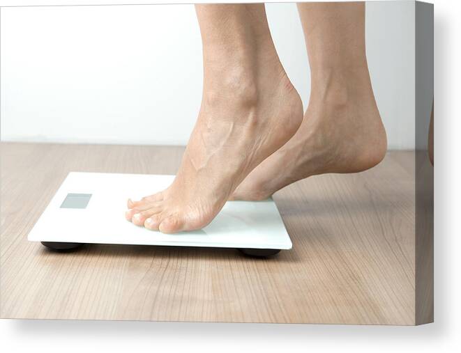 People Canvas Print featuring the photograph Weighing Scale by Simarik