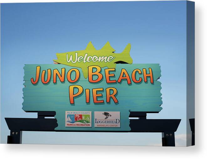 Sign Canvas Print featuring the photograph Welcome Juno Beach Pier by Laura Fasulo