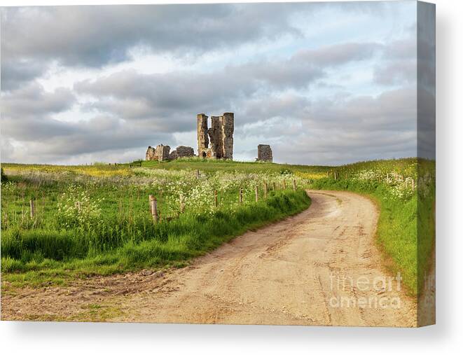 British Canvas Print featuring the photograph Winding road leading to a chirch ruin in Norfolk by Simon Bratt