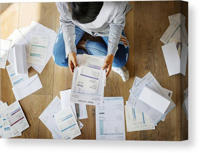 Debt Canvas Print featuring the photograph Woman managing the debt by Rawpixel