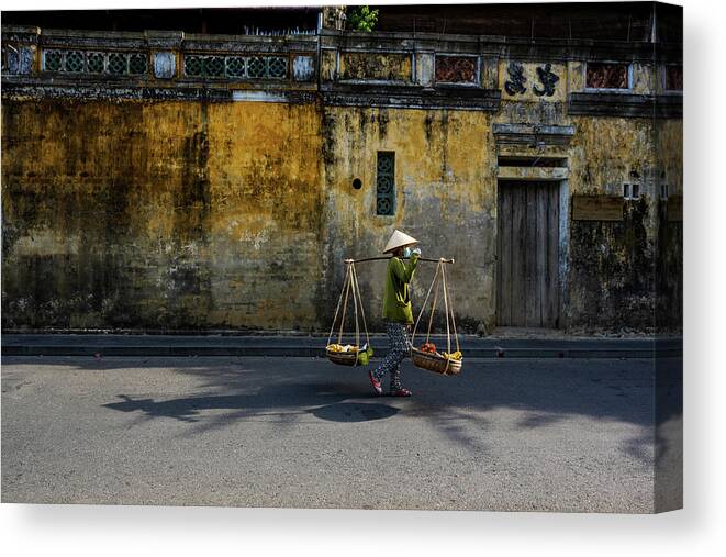 Awesome Canvas Print featuring the photograph Woman selling street on Hoi An ancient town by Khanh Bui Phu