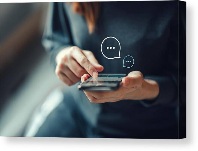 Internet Canvas Print featuring the photograph Women's hand typing on mobile smartphone, Live Chat Chatting on application Communication Digital Web and social network Concept. by Oatawa