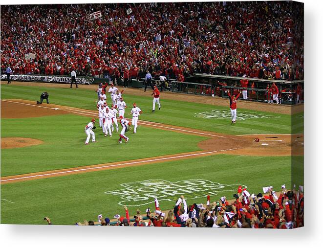 St. Louis Cardinals Canvas Print featuring the photograph Yadier Molina and Jason Motte by Dilip Vishwanat