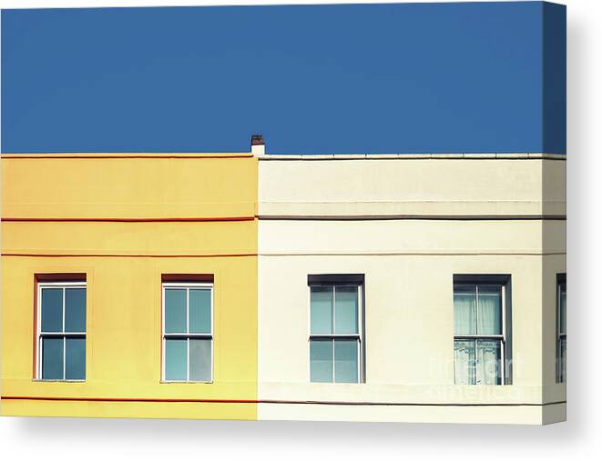 Architecture Canvas Print featuring the photograph Yellow house, white house and blue sky. by Jane Rix