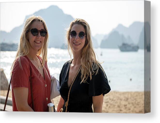 Northern Vietnam Canvas Print featuring the photograph Youth and beauty in Halong Bay by Dubi Roman