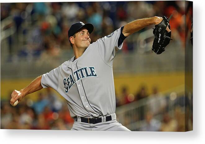 American League Baseball Canvas Print featuring the photograph Seattle Mariners V Miami Marlins by Mike Ehrmann