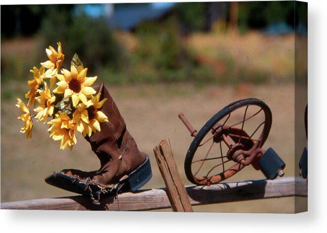 Flowers Canvas Print featuring the photograph Boot with flowers by Ron Roberts