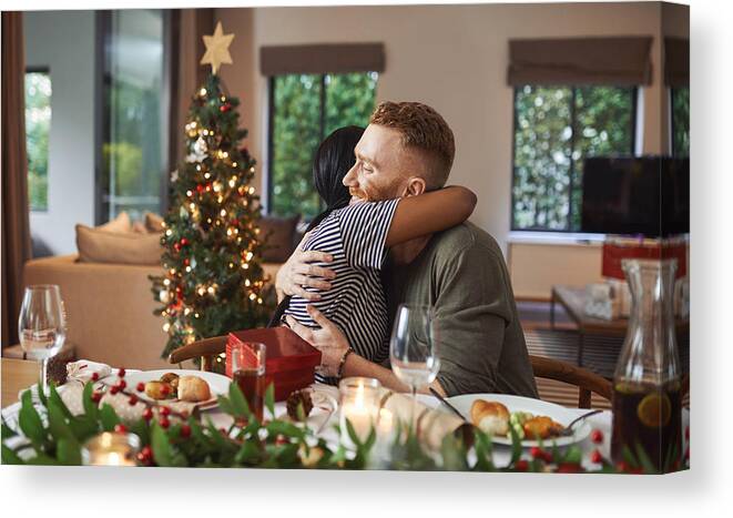 Young Men Canvas Print featuring the photograph The season for love and togetherness by Mapodile