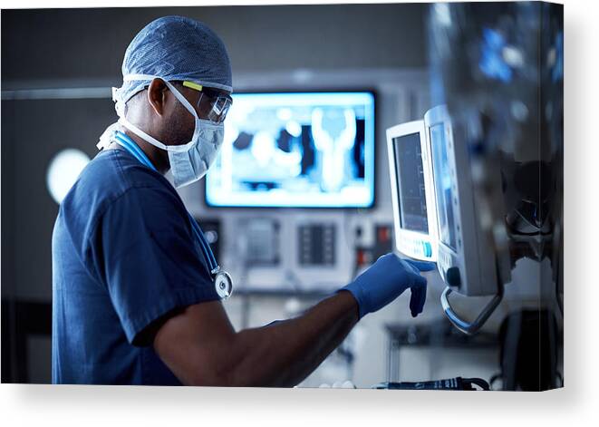Expertise Canvas Print featuring the photograph Vigilantly monitoring his patient's vitals by Shapecharge