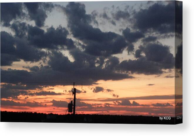 Sunset Canvas Print featuring the photograph Sunset over the Outer Banks by Kim Galluzzo Wozniak