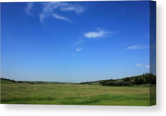 Alberta Prairie Farm Canvas Print featuring the photograph Wide open Alberta prairies by Jim Sauchyn