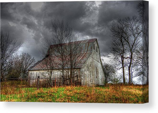 Dark Clouds Canvas Print featuring the photograph A Barn in the Storm 3 by Karen McKenzie McAdoo