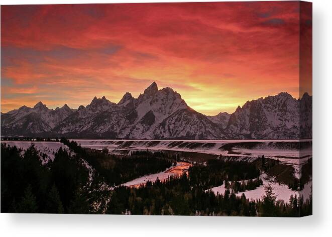 Sunset Canvas Print featuring the photograph Fiery Sunset on Snake River by Ronnie And Frances Howard