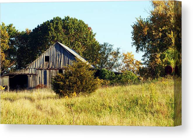 Barn Canvas Print featuring the photograph Weathered Barn in Fall by Cricket Hackmann