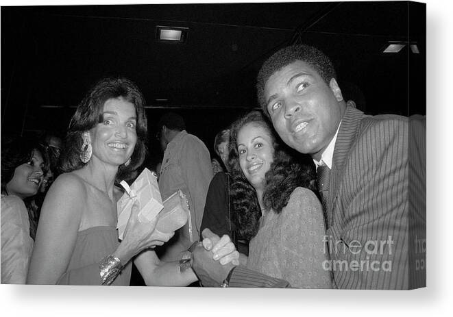 Charity Benefit Canvas Print featuring the photograph Jackie Onassis With Boxer Muhammad Ali by Bettmann