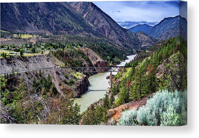 Alex Lyubar Canvas Print featuring the photograph Railway bridge over the mountains river by Alex Lyubar