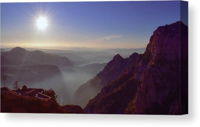 Sunrise Canvas Print featuring the photograph Sunrise over the mountains from Abbey of Montserrat by Christina McGoran