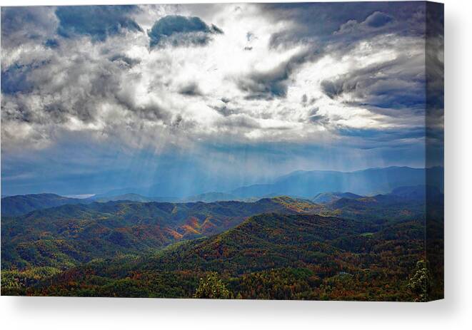Clouds Canvas Print featuring the photograph Breaking Through by Gina Fitzhugh