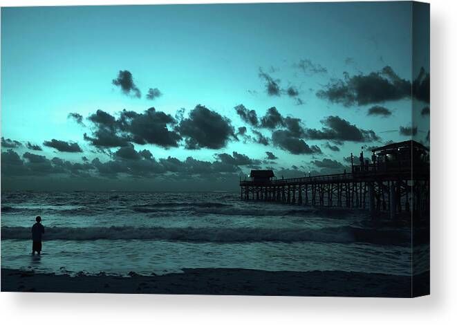 Man Fishing Photo Canvas Print featuring the photograph Man Fishing beside Cocoa Beach Pier Florida by Bob Pardue