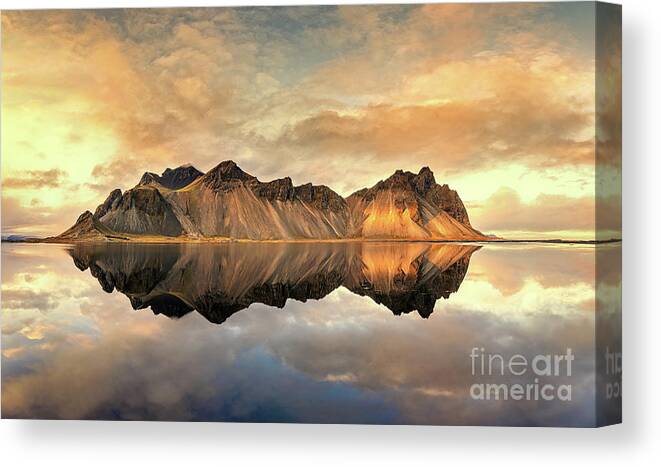 Vestrahorn Canvas Print featuring the photograph Sunset at Vestrahorn with mirror reflection. Iceland in autumn. by Jane Rix