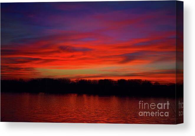 Nature Canvas Print featuring the photograph Sunset With Vermilion Kisses by Leonida Arte