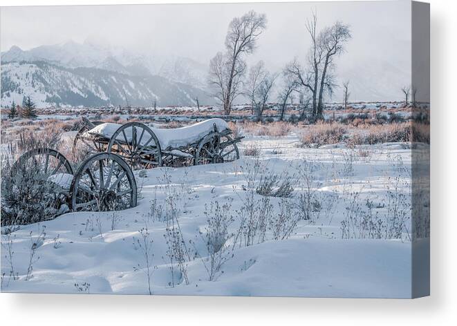 Grand Teton National Park Canvas Print featuring the photograph Wagons in the Snow, Grand Tetons by Marcy Wielfaert
