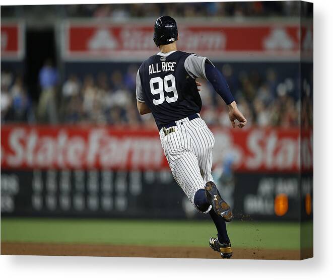 People Canvas Print featuring the photograph Seattle Mariners v New York Yankees by Rich Schultz