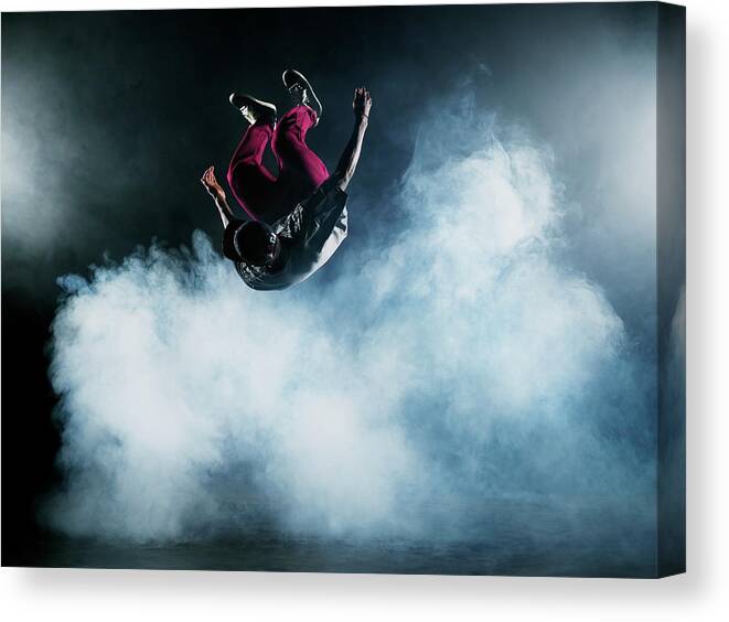 Copenhagen Canvas Print featuring the photograph Dancer Leaping Through Smoke #2 by Henrik Sorensen