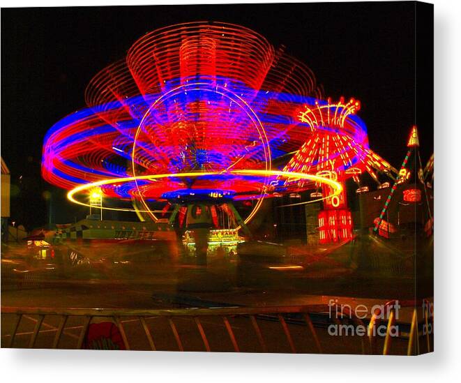 Night Photos Canvas Print featuring the photograph All The Rides Moving At Once by Jeff Swan