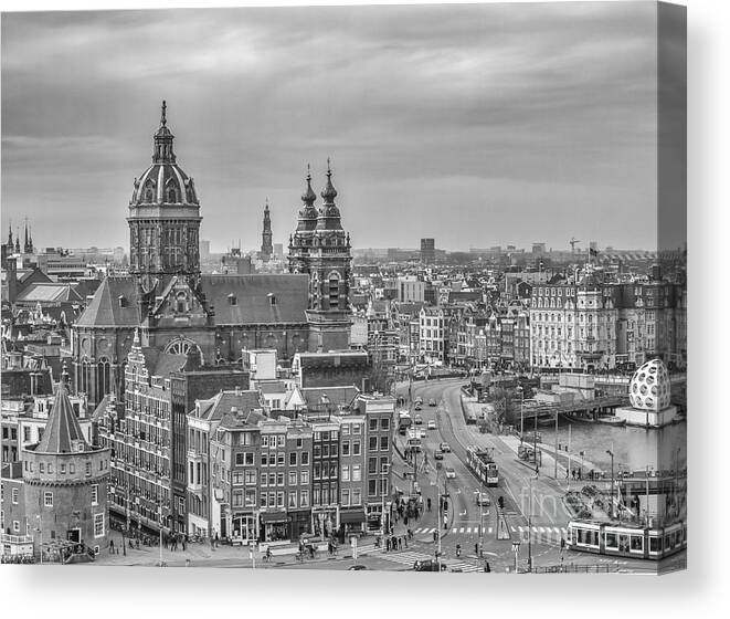 Amsterdam Canvas Print featuring the photograph Amsterdam view with St.Nicolaaschurch by Patricia Hofmeester