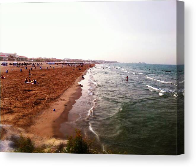 Water's Edge Canvas Print featuring the photograph Beach Of Valencia, Spain by Nadieshda
