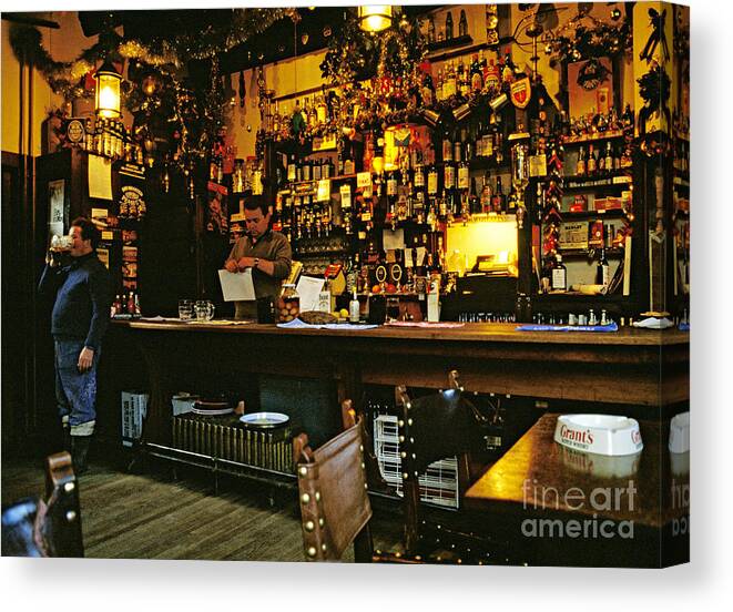 Bar Canvas Print featuring the photograph English Pub at Christmas-time UK 1980s by David Davies