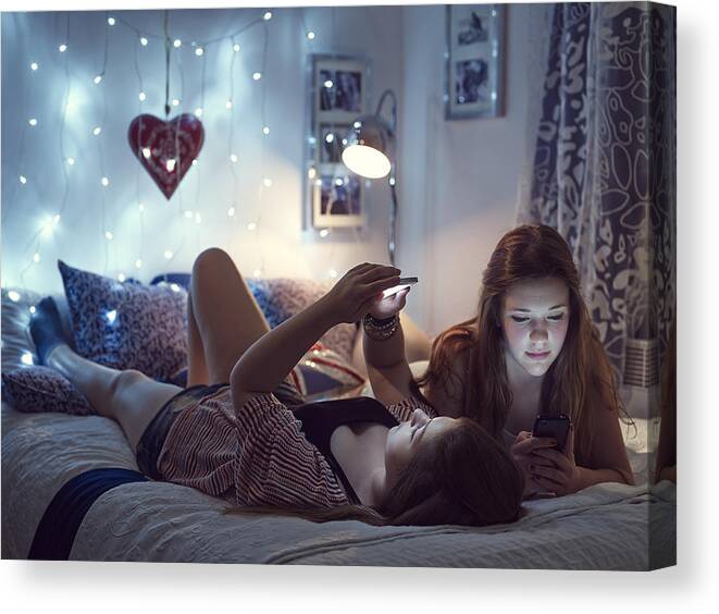 Adolescence Canvas Print featuring the photograph Girls On Phones by Mark Mawson