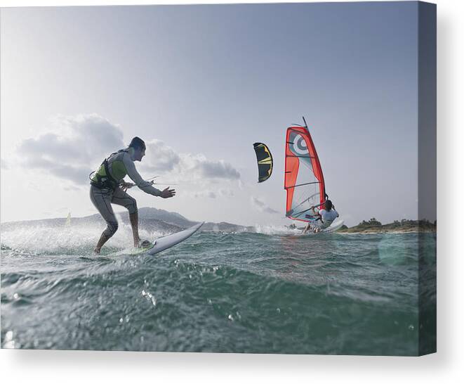 Outdoors Canvas Print featuring the photograph Kitesurfer And Windsurfer by Ben Welsh