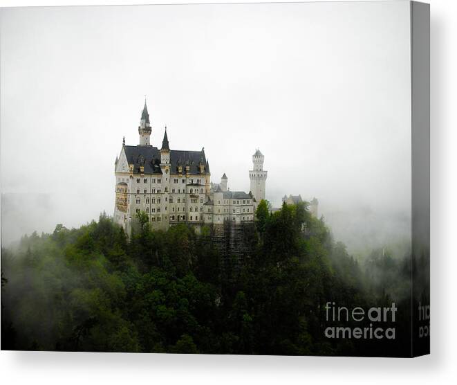 Castle Canvas Print featuring the photograph Neuschwanstein in the clouds by Ksenia VanderHoff