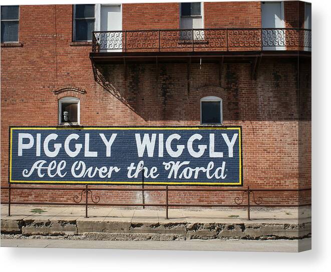 Piggly Wiggly Canvas Print featuring the photograph One Famous Pig by Jeff Mize