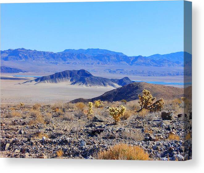 Sky Canvas Print featuring the photograph Outcrop by Marilyn Diaz