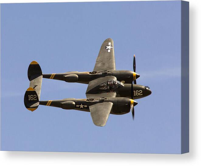 P-38 Canvas Print featuring the photograph P-38 Lightning by John Daly