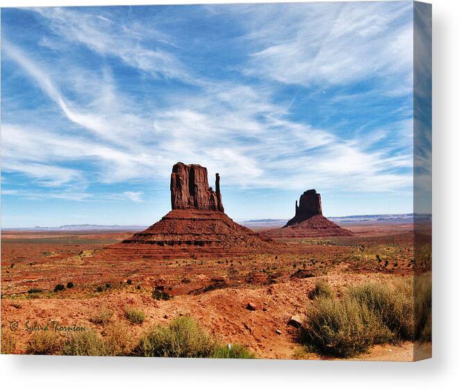 Monument Valley Canvas Print featuring the photograph Saluting Sentinels by Sylvia Thornton