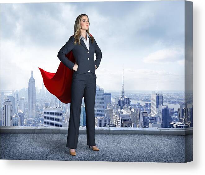 People Canvas Print featuring the photograph Superhero Businesswoman With Cityscape In The Background by Dny59