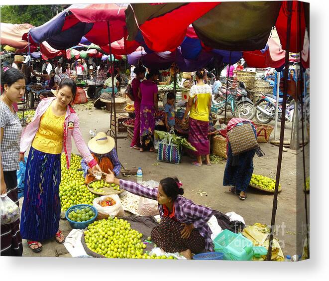 Burmese Lady Selling Fresh Green Limes Canvas Print featuring the photograph The Hustling Market on 85th Street Zay Cho Street Market Mandalay Burma by PIXELS XPOSED Ralph A Ledergerber Photography