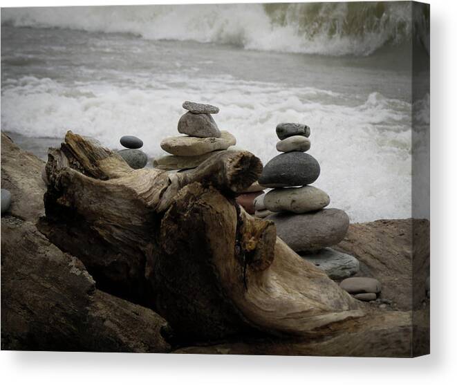  Canvas Print featuring the photograph Driftwood Cairns #1 by Kimberly Mackowski