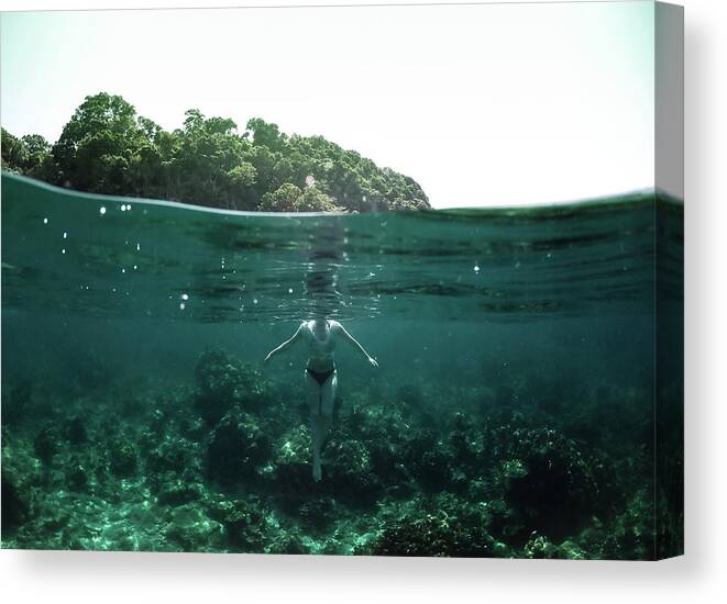 Underwater Canvas Print featuring the photograph Floating by Nicklas Gustafsson