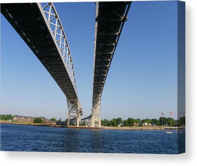 Bridge Canvas Print featuring the photograph From Under and Between by Peggy King