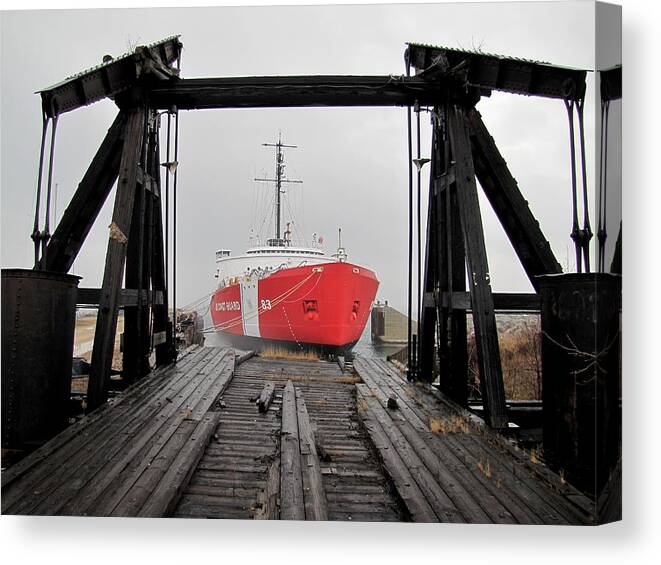 Mackinaw Canvas Print featuring the photograph USCGC Mackinaw framed by railroad elevator by Keith Stokes