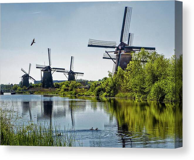Kinderdijk Canvas Print featuring the photograph Windmills of Kinderdijk, Netherlands by Phil Cardamone