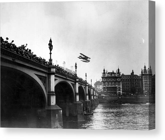 Crowd Canvas Print featuring the photograph Flying Over Bridge #1 by Kirby